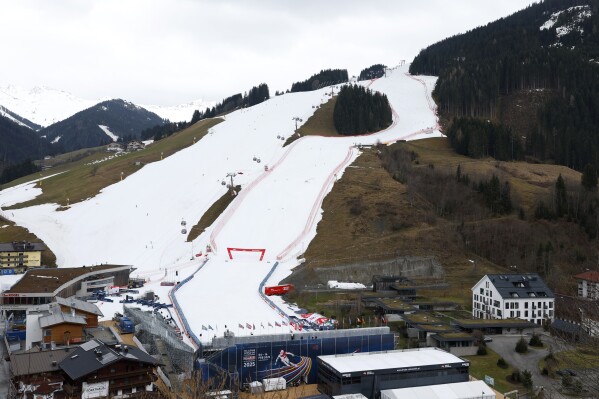 A view of the strip of snow for the slope which will be used for Friday's alpine ski, men's and women's, World Cup super G races, in Saalbach, Austria, Thursday, March 21, 2024. (AP Photo/Alessandro Trovati)