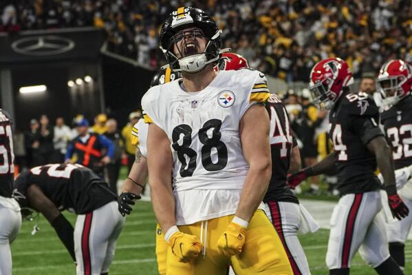 Pittsburgh Steelers tight end Pat Freiermuth (88) celebrates a long run against the Atlanta Falcons during the first half of an NFL football game, Sunday, Dec. 4, 2022, in Atlanta. (AP Photo/John Bazemore)