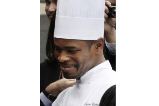 FILE - White House Chef Tafari Campbell smiles Nov. 6, 2008, on the South Lawn of the White House in Washington. Campbell, an employee of former President Barack Obama, has drowned near the couple’s home on Martha’s Vineyard. Massachusetts State Police confirmed that the paddleboarder whose body was recovered from Edgartown Great Pond on Monday, July 24, 2023 was Tafari Campbell, of Dumfries, Virginia. (AP Photo/Ron Edmonds, file)