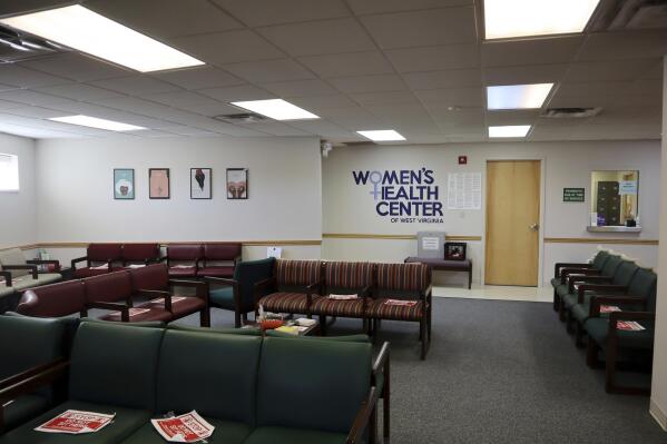 The waiting room of the Women's Health Center of West Virginia in Charleston, W.Va. sits empty on Wednesday June 29, 2022. After the U.S. Supreme Court ruling that overturned Roe v. Wade, the clinic had to suspend abortion services because of an 1800s-era abortion ban in West Virginia state code. (AP Photo/Leah Willingham)