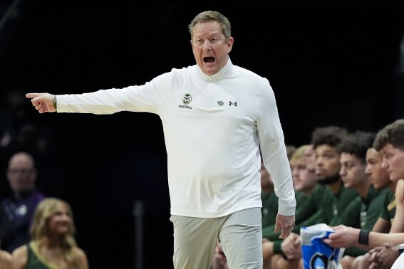Colorado State head coach Niko Medved yells during the first half of a first-round college basketball game against Texas in the NCAA Tournament, Thursday, March 21, 2024, in Charlotte, N.C. (AP Photo/Chris Carlson)