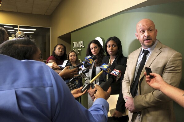 Prosecutor Paul Hagerman speaks with reporters outside a courtroom after a hearing for the five former Memphis police officers charged in the beating and death of Tyre Nichols, Friday, Aug. 18, 2023, in Memphis. (AP Photo/Adrian Sainz)