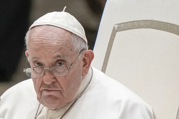 FILE - Pope Francis attends his weekly general audience in the Pope Paul VI hall at the Vatican, Wednesday, Aug. 23, 2023. The Vatican on Tuesday, Aug. 29, 2023, sought to tamp down an uproar that erupted after Pope Francis praised Russia’s imperialist past during a video conference with Russian Catholics youths, insisting that he never intended to encourage modern-day Russian aggression in Ukraine. (AP Photo/Andrew Medichini, File)