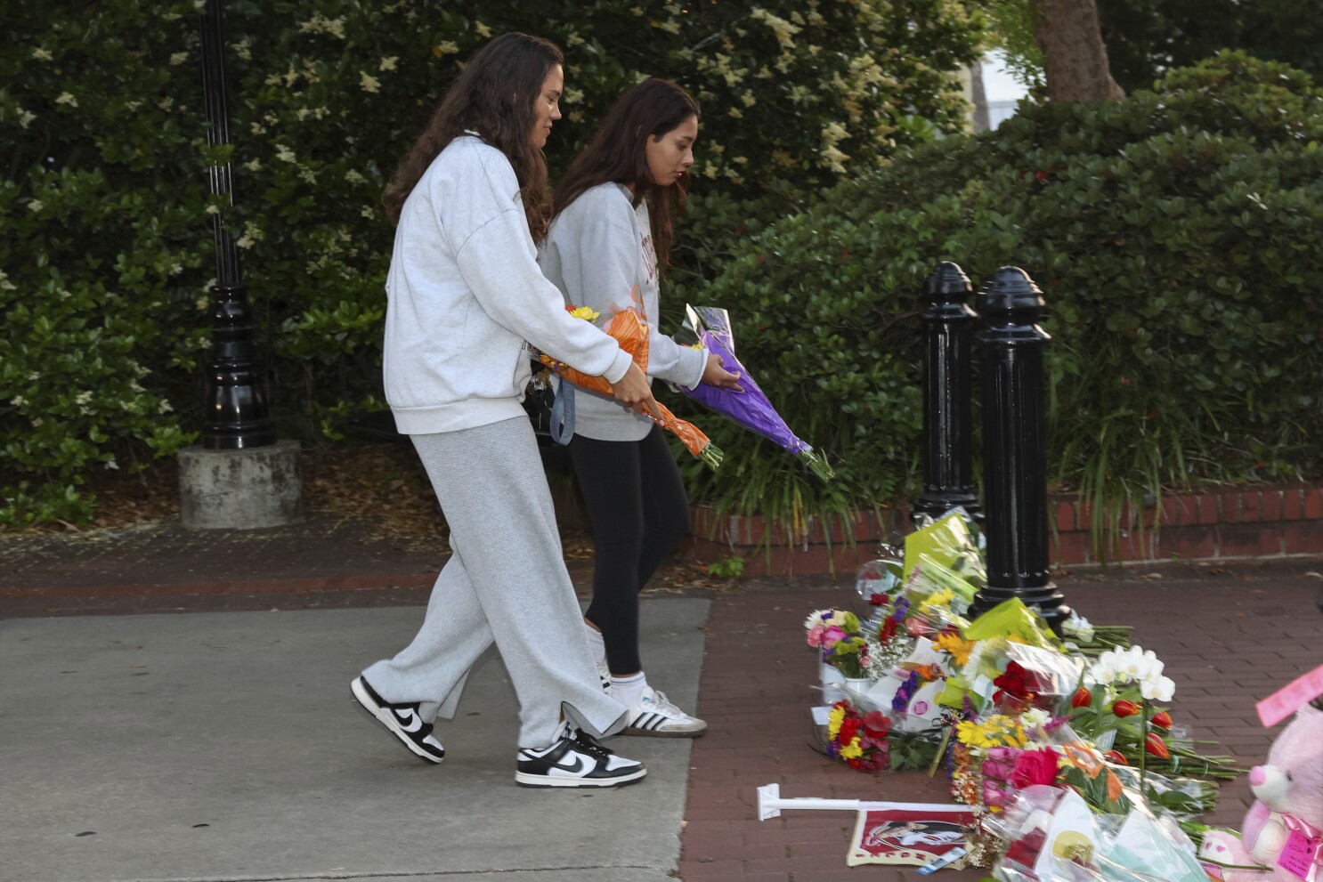 Man accused in Florida State shooting out of hospital and booked into jail on murder charges