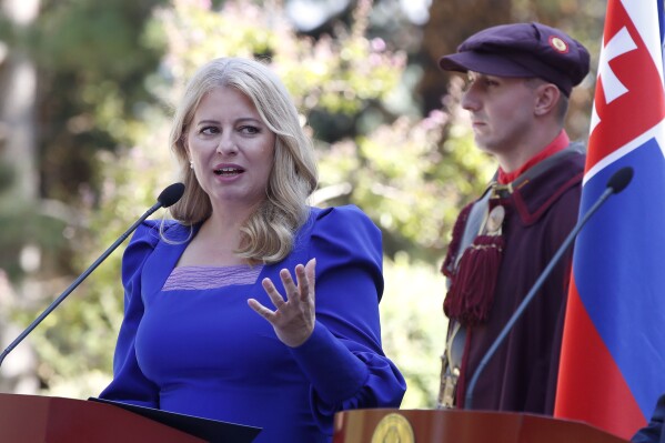 FILE - Slovakia's President Zuzana Caputova talks for the media during a news conference in Skopje, North Macedonia, Wednesday, Sept. 7, 2022. Slovakia’s president decided on Thursday to postpone the appointment of a new government after she rejected the nomination of a climate change denier to become the environment minister. Liberal President Zuzana Caputova said in a statement that Rudolf Huliak, who was nominated by the ultranationalist and pro-Russian Slovak National Party, cannot ensure the proper functioning of the ministry because he opposes the long-term environmental policies of the state and Slovakia’s international obligations. (AP Photo/Boris Grdanoski, File)