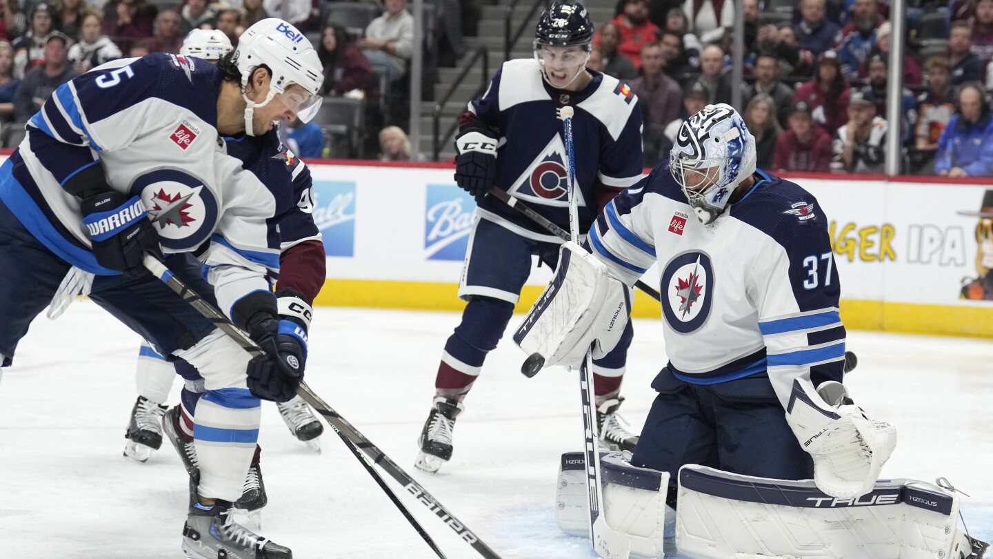 Connor Hellebuyck's 250th career win helps Jets to a 4-2 victory over ...