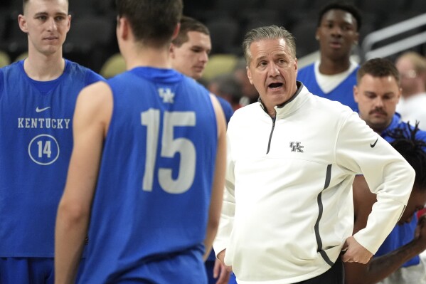 Kentucky head coach John Calipari, right, gives directions during NCAA college basketball team practice at PPG Paints Arena in Pittsburgh, Wednesday, March 20, 2024. Kentucky faces Oakland in the first round of the NCAA Tournament Thursday. (AP Photo/Gene J. Puskar)