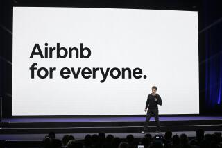 FILE- In this Feb. 22, 2018, photo, Airbnb co-founder and CEO Brian Chesky speaks during an event in San Francisco. Airbnb will ban some younger U.S. guests from booking homes in their area as part of a continuing effort to crack down on unauthorized parties. The San Francisco-based home sharing company said U.S. guests under age 25 with fewer than three positive Airbnb reviews won’t be allowed to book entire homes close to where they live. (AP Photo/Eric Risberg, File)