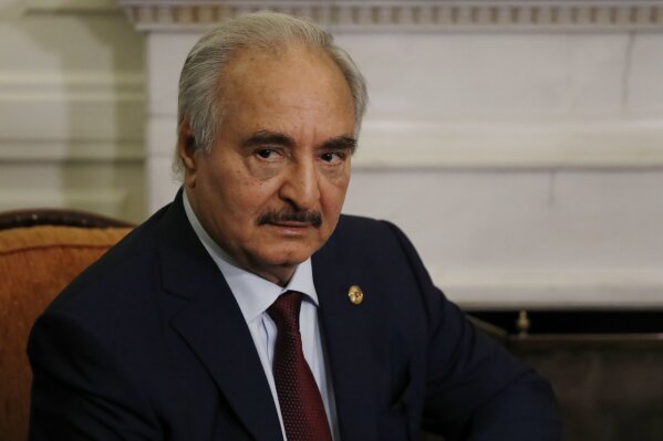 FILE - This Jan. 17, 2020 file photo shows Libyan Gen. Khalifa Hifter during a meeting in Athens. Libyan rivals on Monday, Sept. 28, 2020 restarted military and security talks, aiming to reach a settlement that could help end the county’s years-long conflict, the United Nations said. The face-to-face military talks came amid international pressure on both sides of the war and their foreign backers to avert an attack on the strategic city of Sirte, after a year-long assault on the capital, Tripoli, by forces of military commander Khalifa Hifter collapsed this summer. (AP Photo/Thanassis Stavrakis, File)