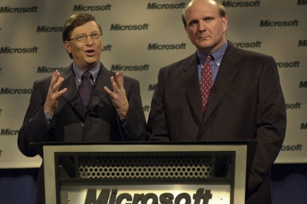 FILE - Microsoft chairman Bill Gates, left, and president and CEO Steve Ballmer speak at a news conference on April 3, 2000 in Redmond, Wash. The U.S. Justice Department's double-barreled antitrust attack on Google's dominant search and Apple's trendsetting iPhone is reviving memories of another epic battle that hobbled Microsoft before it roared back to yet again become the world's most valuable company. (AP Photo/Elaine Thompson, File)
