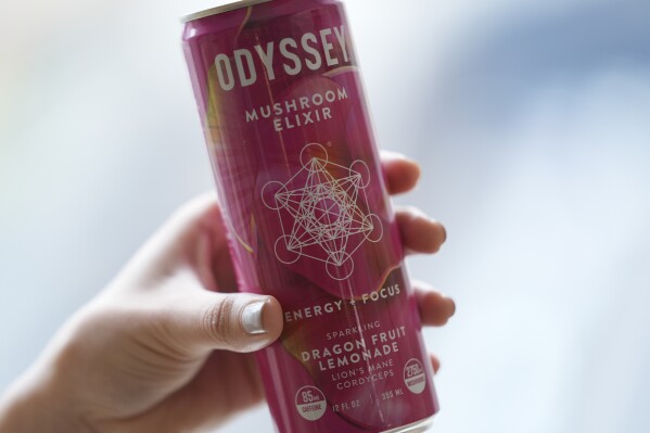 A can of Odyssey mushroom elixir is shown, Wednesday, April 10, 2024, in New York. Hundreds of brands of functional beverages - drinks designed to do more than just taste good or hydrate - are vying for consumers’ attention. (AP Photo/John Minchillo)