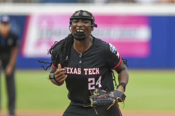 Texas Tech pitcher NiJaree Canady celebrates during the first game of the NCAA softball Women's College World Series finals against Texas in Oklahoma City, Wednesday, June 4, 2025. (AP Photo/Kyle Phillips)