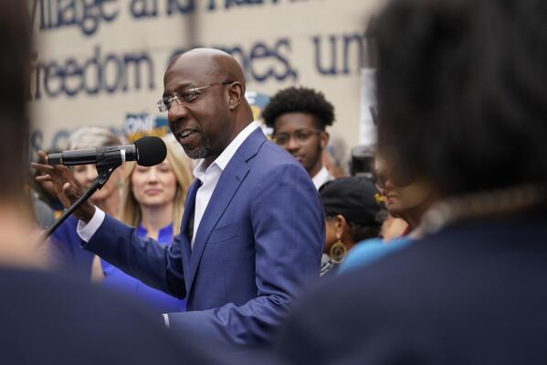 Democratic nominee for U.S. Senate Sen. Raphael Warnock speaks during a news conference, Thursday, Nov. 10, 2022, in Atlanta. Warnock is running against Republican Herschel Walker in a runoff election. (AP Photo/Brynn Anderson)