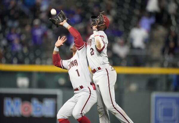 Rockies beat D-backs with five home runs, including a 504-foot blast by  C.J. Cron and a walk-off by Elias Diaz