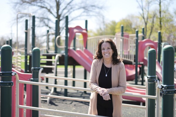 Jane Gaudreau, mother of hockey players Johnny and Matthew Gaudreau who were fatally struck by a motorist while riding bicycles, poses for a photograph at Archbishop Damiano School in Westville, N.J., Wednesday, April 9, 2025. (AP Photo/Matt Rourke)