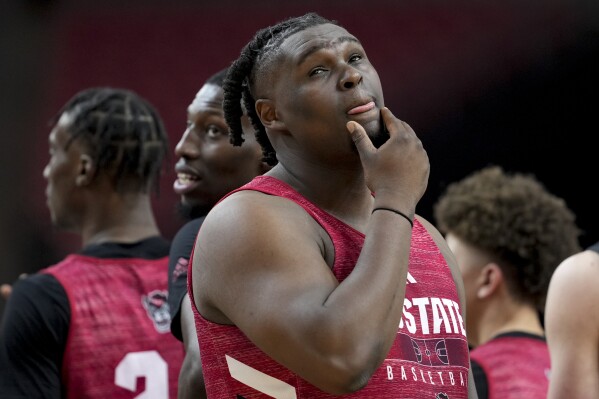North Carolina State forward DJ Burns Jr. (30) watches during practice ahead of a Final Four college basketball game in the NCAA Tournament, Friday, April 5, 2024, in Glendale, Ariz. North Carolina State plays Purdue. (AP Photo/David J. Phillip)