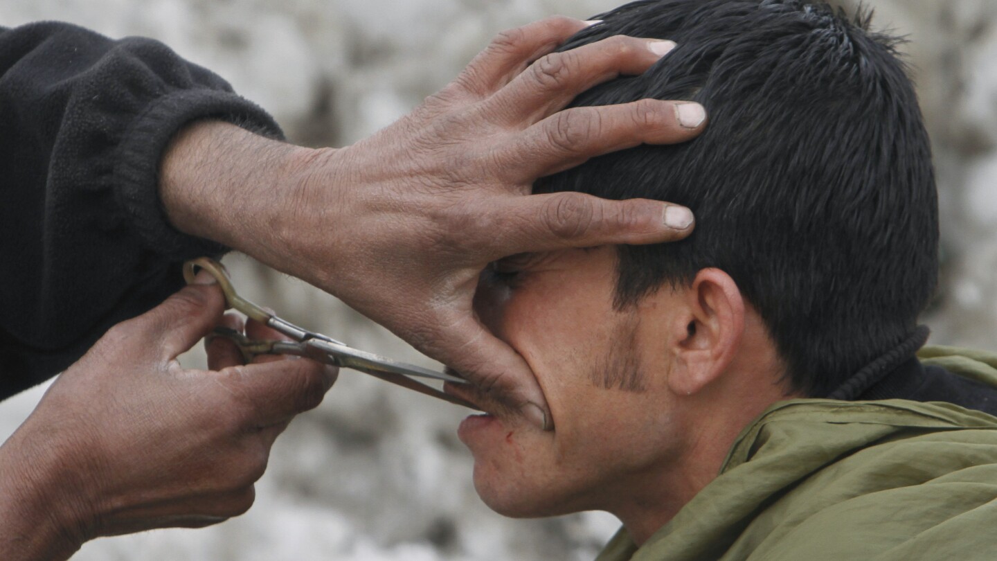 Taliban morality enforcers arrest men for having the wrong hairstyle or skipping mosque, UN says