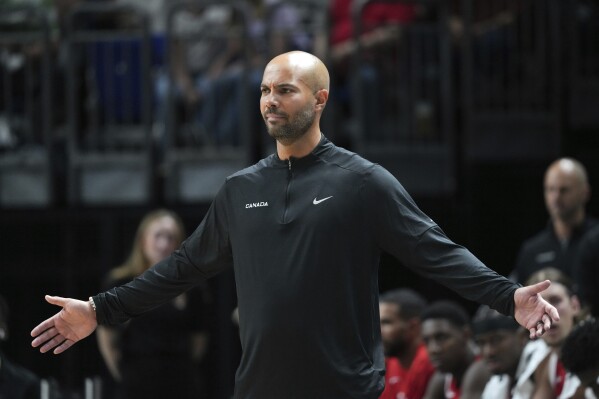 Canada's head coach Jordi Fernandez gestures during a firendly basketball match between Germany and Canada in Berlin, Germany, Wednesday, Aug. 9 2023. (Soeren Stache/dpa via AP)