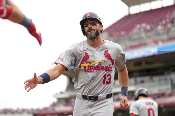 St. Louis Cardinals' Matt Carpenter (13) celebrates with teammates after hitting a solo home run during the third inning of a baseball game against the Cincinnati Reds, Wednesday, May 29, 2024, in Cincinnati. (AP Photo/Jeff Dean)