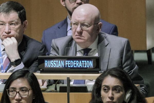 Russia United Nations Ambassador Vassily Nebenzia, center right, listens before the U.N. General Assembly vote in favor of a U.N. resolution upholding Ukraine's territorial integrity and calling for a cessation of hostilities after Russia's invasion, Thursday Feb. 23, 2023 at U.N. headquarters. (AP Photo/Bebeto Matthews)