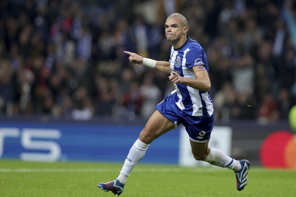 Porto's Pepe celebrates scoring his side's second goal during a Champions League group H soccer match between Porto and Antwerp at Estadio do Dragao in Porto, Portugal, Tuesday, Nov. 7, 2023. (AP Photo/Miguel Pereira)