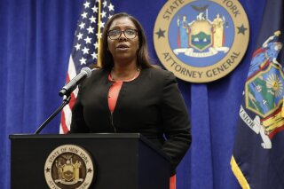 FILE- In this Aug. 6, 2020 file photo, New York State Attorney General Letitia James addresses the media during a news conference in New York. On Friday, Sept. 25, 2020, James recommended the New Y...