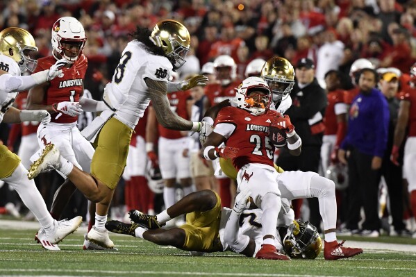 No. 25 Louisville beats No. 10 Notre Dame 33-20, with Jawhar Jordan running  for 143 yards, 2 TDs