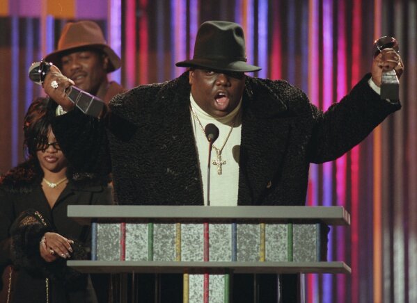 FILE - Notorious B.I.G accepts rap artist and rap single of the year during the Billboard Music Awards, Dec. 6, 1995, in New York. (AP Photo/Mark Lennihan, File)
