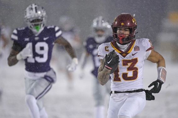 Iowa State wide receiver Jaylin Noel (13) runs for a touchdown during the second half of an NCAA college football game against Kansas State Saturday, Nov. 25, 2023, in Manhattan, Kan. (AP Photo/Charlie Riedel)