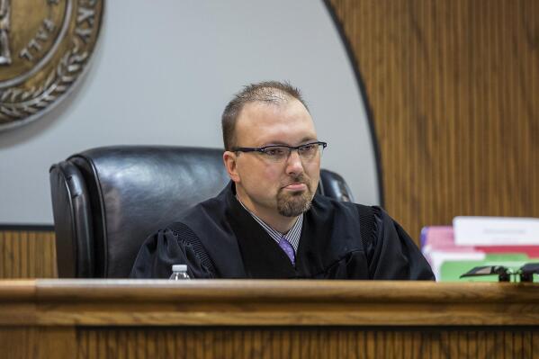FILE - Marshall County Circuit Court Judge Jamie Jameson listens to proceedings during a hearing at the Marshall County Judicial Building in Benton, Ky., Monday, March 12, 2018. Jameson was suspended with pay on Friday, Aug. 12, 2022, following testimony that he pressured a lawyer practicing in his court to support his reelection campaign. (Ryan Hermens/The Paducah Sun via AP, File)