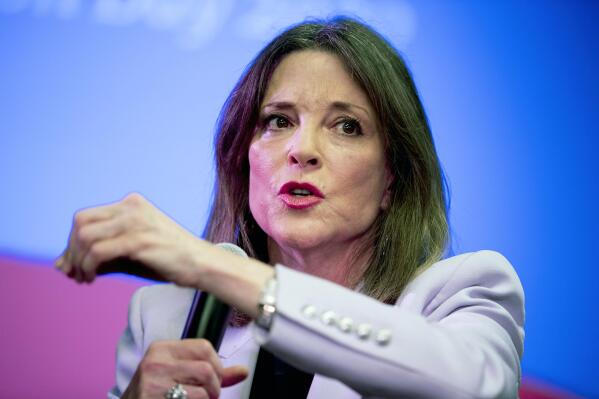 FILE - Democratic presidential candidate Marianne Williamson speaks at the Faith, Politics and the Common Good Forum at Franklin Jr. High School, Jan. 9, 2020, in Des Moines, Iowa. (AP Photo/Andrew Harnik, File)