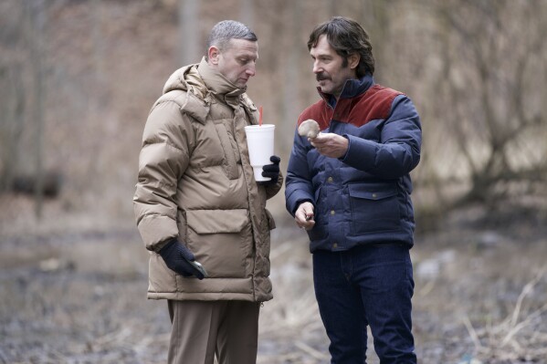 Tim Robinson, left, and Paul Rudd in a scene from "Friendship." (A24 via AP)