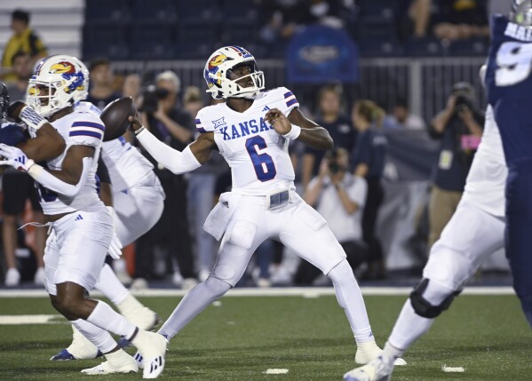 University of Kansas football program debut black uniforms