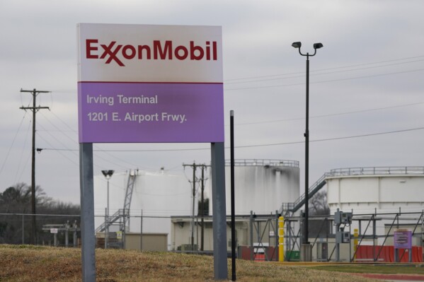 File - A sign marks the entrance to an ExxonMobil fuel storage and distribution facility in Irving, Texas, Jan. 25, 2023. Exxon Mobil reports earnings on Friday, Feb. 2, 2024. (AP Photo/LM Otero, File)