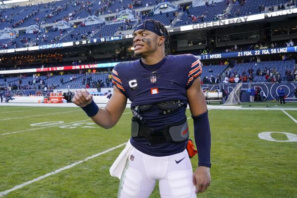 Chicago Bears' Justin Fields leaves the field after an NFL football game against the Green Bay Packers Sunday, Dec. 4, 2022, in Chicago. The Packers won 28-19. (AP Photo/Nam Y. Huh)