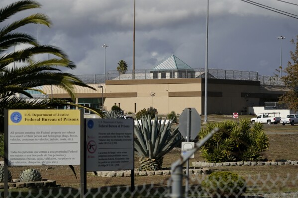FILE - The Federal Correctional Institution stands in Dublin, Calif., Dec. 5, 2022. The federal government is asking a court to halt California's enforcement of a rule requiring prison guards be clean-shaven, saying it amounts to religious discrimination for Sikhs, Muslims and others who wear beards as an expression of their faith. (AP Photo/Jeff Chiu, File)