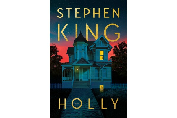 This cover image released by Scribner shows "Holly" by Stephen King. (Scribner via AP)