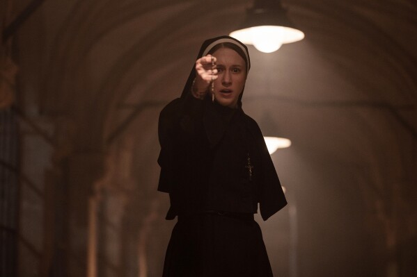 This image released by Warner Bros. Pictures shows Taissa Farmiga as Sister Irene in New Line Cinema's horror thriller "The Nun II." (Warner Bros. Pictures via AP)