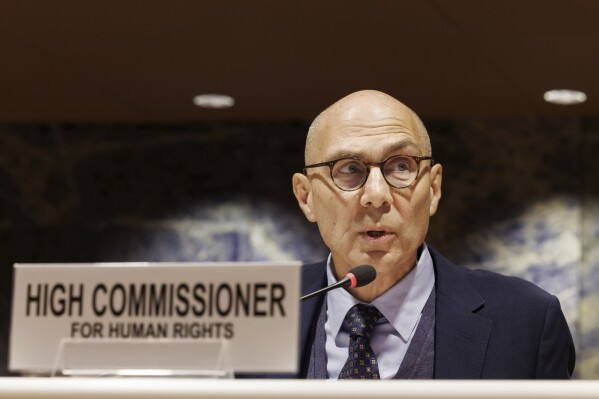 FILE - U.N. High Commissioner for Human Rights Volker Türk speaks at the European headquarters of the United Nations in Geneva, Switzerland, Thursday, Nov. 16, 2023. The U.N. human rights office says in a report published Friday, March 8, 2024, that the establishment and expansion of Israeli settlements in the West Bank and east Jerusalem amount to a war crime. (Salvatore Di Nolfi/Keystone via AP, File)