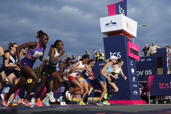 Women's elite division runners make their way onto the Verrazano Narrows Bridge at the start of the New York City Marathon, Sunday, Nov. 5, 2023, in New York. (AP Photo/Frank Franklin II)