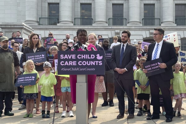 Wisconsin Sen. LaTonya Johnson and other Democratic state lawmakers call on Republicans who control the Legislature to permanently fund child care support grants on Thursday, June 15, 2023, in Madison, Wis. The Child Care Counts program has until now been paid for by federal pandemic aid. (AP Photo/Harm Venhuizen)