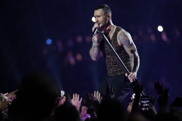 
              FILE - In this Feb. 3, 2019 file photo, Adam Levine, of Maroon 5, performs during halftime of the NFL Super Bowl 53 football game between the Los Angeles Rams and the New England Patriots in Atlanta. Levine is leaving NBC’s “The Voice” after 16 seasons. Carson Daly made the announcement Friday morning, May 24 on the “Today” show. Daly said Gwen Stefani will return for season 17 in Levine’s chair. (AP Photo/Mark Humphrey, File)
            