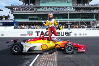 FILE - Josef Newgarden celebrates on the finish line after winning the Indianapolis 500 auto race at Indianapolis Motor Speedway in Indianapolis, Sunday, May 28, 2023. “It’s been probably a tougher offseason for cadence and news, but I really think 2024 can be another great step for us in the IndyCar Series,” said Newgarden. (AP Photo/AJ Mast, File)