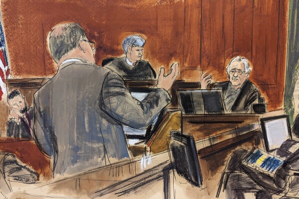 In this courtroom sketch, Robert De Niro, seated background right, is questioned by his attorney Laurent Drogin, foreground, with Judge Lewis J. Liman presiding, background center, in Manhattan federal court, Tuesday, Oct. 31, 2023, in New York. The jury is seated at right. (Elizabeth Williams via AP)