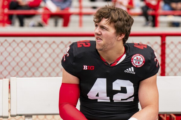 Nebraska linebacker Derek Wacker (42) sits on the bench during an NCAA college football practice Saturday, April 26, 2025, in Lincoln, Neb. (AP Photo/Dylan Widger)