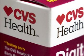 FILE - A CVS Health product is displayed at a store in North Andover, Mass., Monday, May 3, 2021. CVS Health is asking pharmacists in some states to verify that a few of the prescriptions they provide will not be used end a pregnancy. A spokesman said Thursday, July 21, 2022, that the drugstore chain recently started doing this for methotrexate and misoprostol, two drugs used in medication abortions but also to treat other conditions. (AP Photo/Elise Amendola, File)