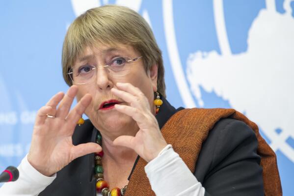 File---File photo shows Michelle Bachelet, UN High Commissioner for Human Rights, speaking to the media about the Tigray, joint investigation into alleged violations of international human rights, humanitarian and refugee law committed by all parties to the conflict in the Tigray region of Ethiopia report by the UN Human Rights Office and the Ethiopian Human Rights Commission, during a press conference at the European headquarters of the United Nations in Geneva, Switzerland, Wednesday, Nov.3, 2021. (Martial Trezzini/Keystone via AP,file)