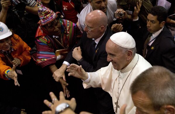 Pope Francis walks amid the crowd while leaving the second World Meeting of Popular Movements in Santa Cruz, Bolivia, July 9, 2015. (AP Photo/Rodrigo Abd)