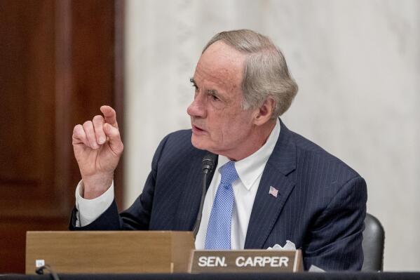 FILE - In this May 20, 2020, file photo, Sen. Tom Carper, D-Del., speaks as the Senate Homeland Security and Governmental Affairs committee meets on Capitol Hill in Washington. Sen. Carper is urging U.S. anti-pollution standards that would follow a deal brokered by California with five automakers and then set targets to end sales of new gas-powered vehicles by 2035. In a letter sent late Thursday, April 29, 2021, to the Environmental Protection Agency, Carper says the administration must move forcefully in the auto sector to achieve Biden’s plan of slashing America’s greenhouse gas emissions in half by 2030. (AP Photo/Andrew Harnik, File)