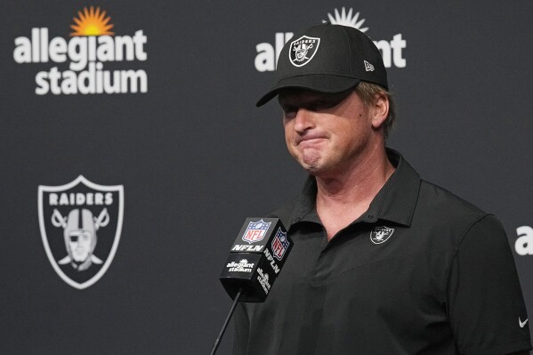 FILE - Then-Las Vegas Raiders head coach Jon Gruden speaks during a news conference after an NFL football game against the Chicago Bears, Sunday, Oct. 10, 2021, in Las Vegas. Gruden lost a Nevada Supreme Court appeal on Tuesday, May 14, 2024, in a contract interference and conspiracy lawsuit he filed against the league after he resigned from the Las Vegas Raiders in 2021. (AP Photo/Rick Scuteri, File)